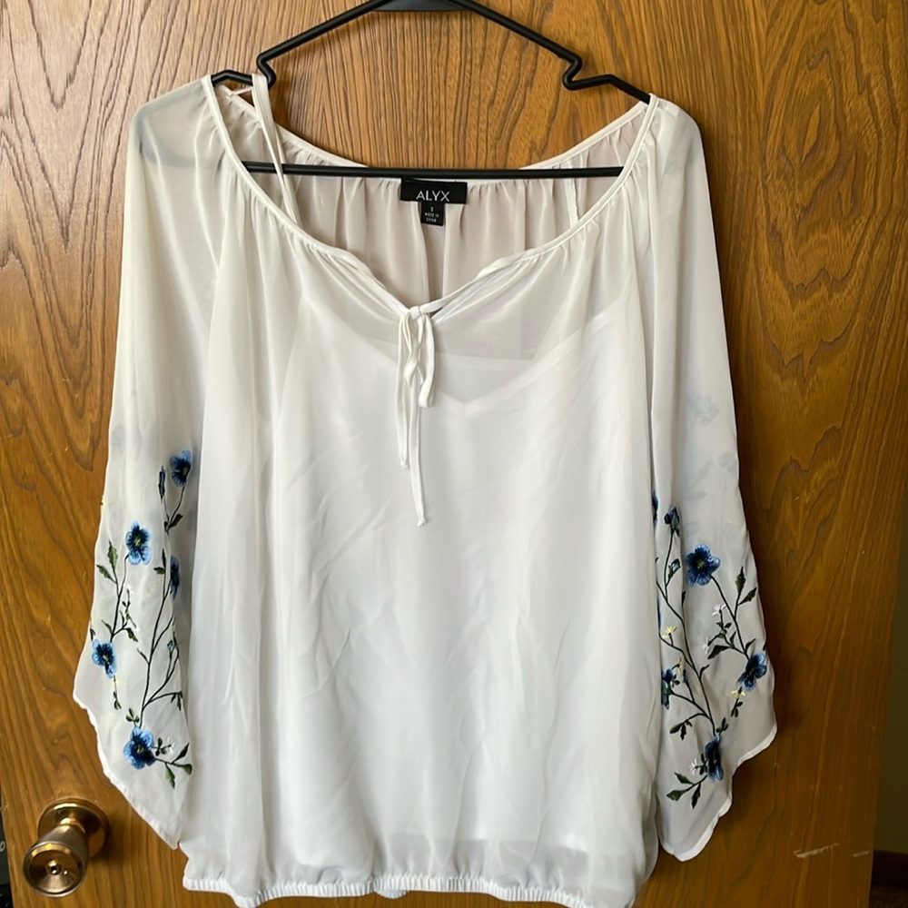Women’s sheer blouse with cute floral sleeves